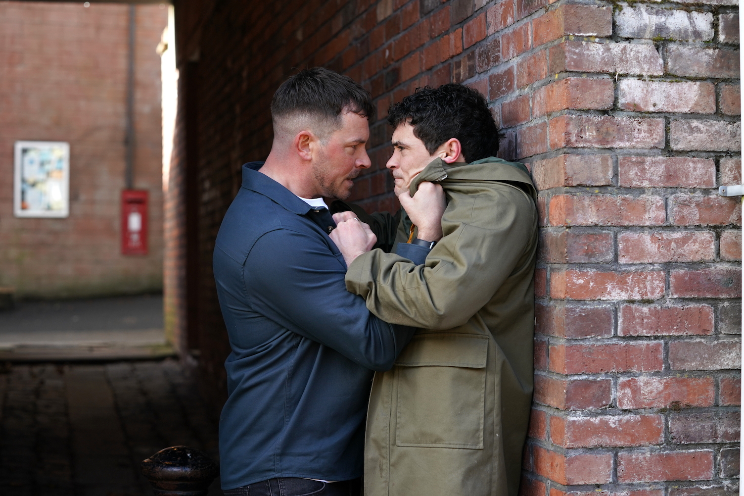 A raging Darren Osborne attacks Rex Gallagher. 