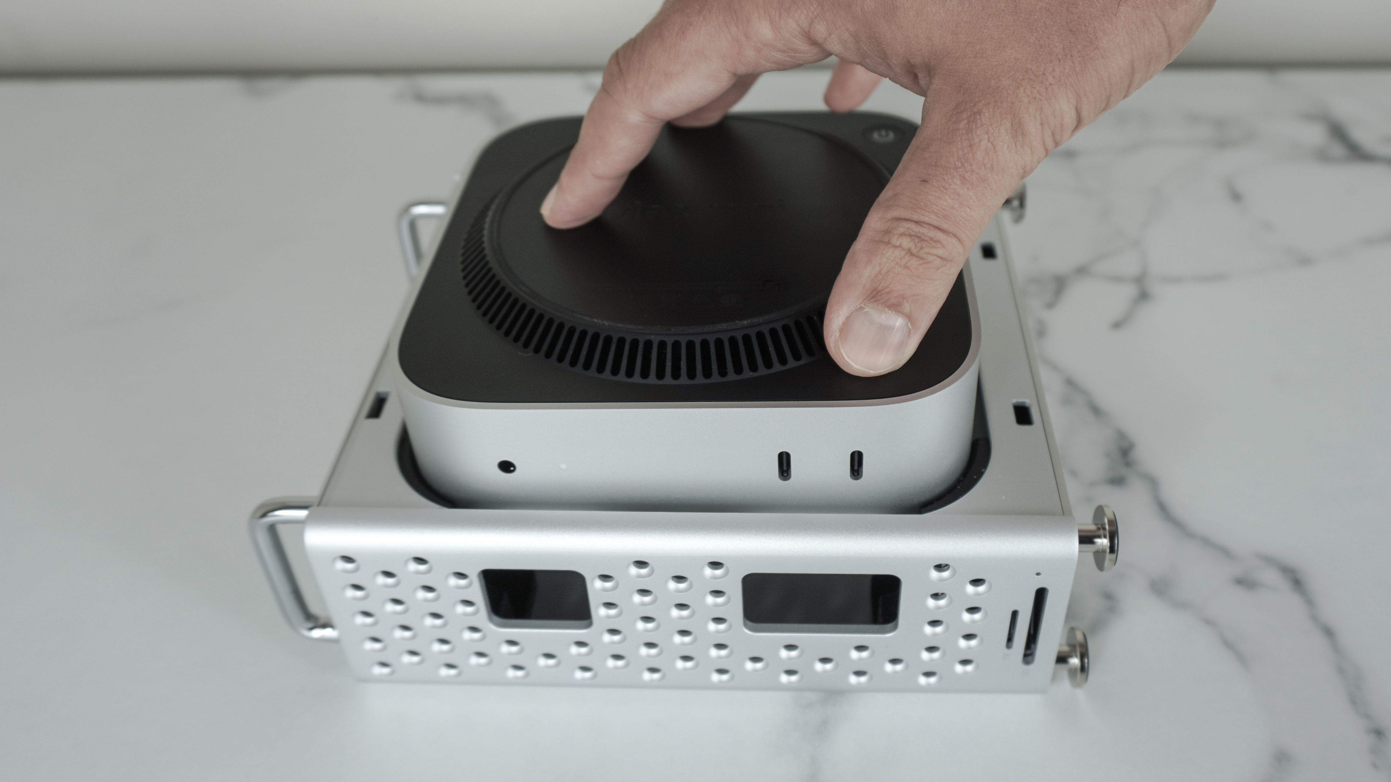 Installing a Mac mini M4 into the Orico MiniPro Dock Case on a desk