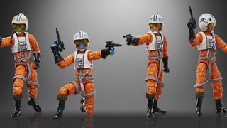 Star Wars The Vintage Collection action figures in X-Wing pilot uniforms and helmets holding blasters in each hand