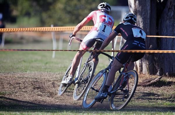 Christian Heule (Rendementhypo Cycling Team) leads Jonathan Page (Planet Bike) around a corner.