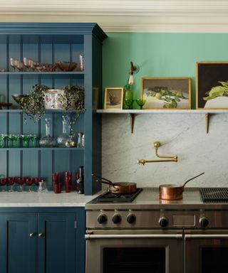 Pot filler taps trend, brassy colored tap by deVOL in a painted kitchen