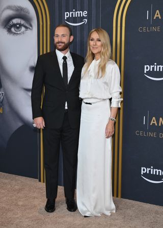 Céline Dion wearing a white button down blouse tucked into a matching maxi skirt at the 'I Am: Celine Dion' New York premiere June 2024