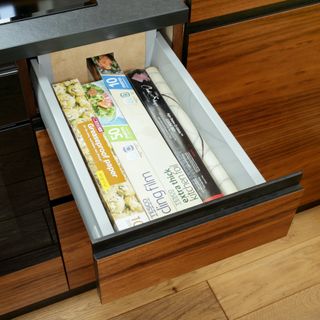 drawer open with foil and cling film
