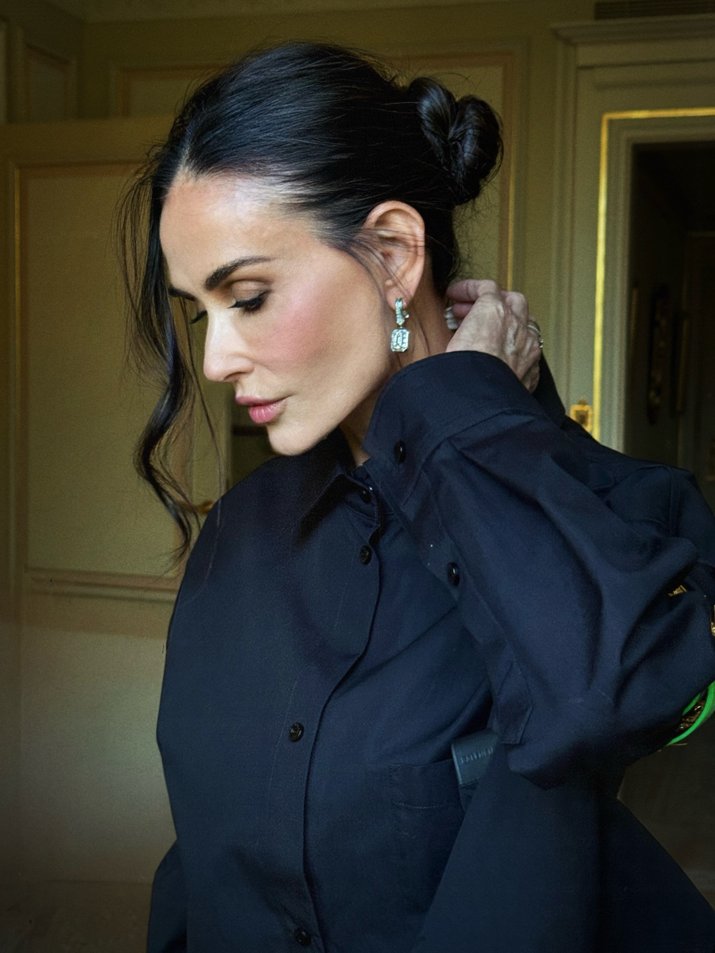 Demi Moore with dark brown hair.