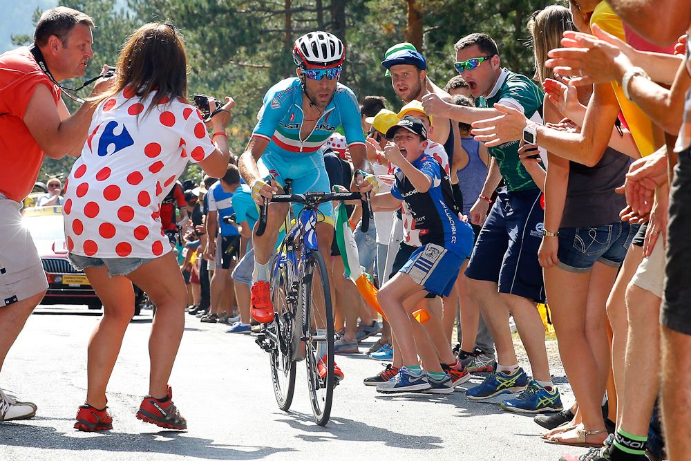 Vincenzo Nibali climbs through the crowds during stage 14.