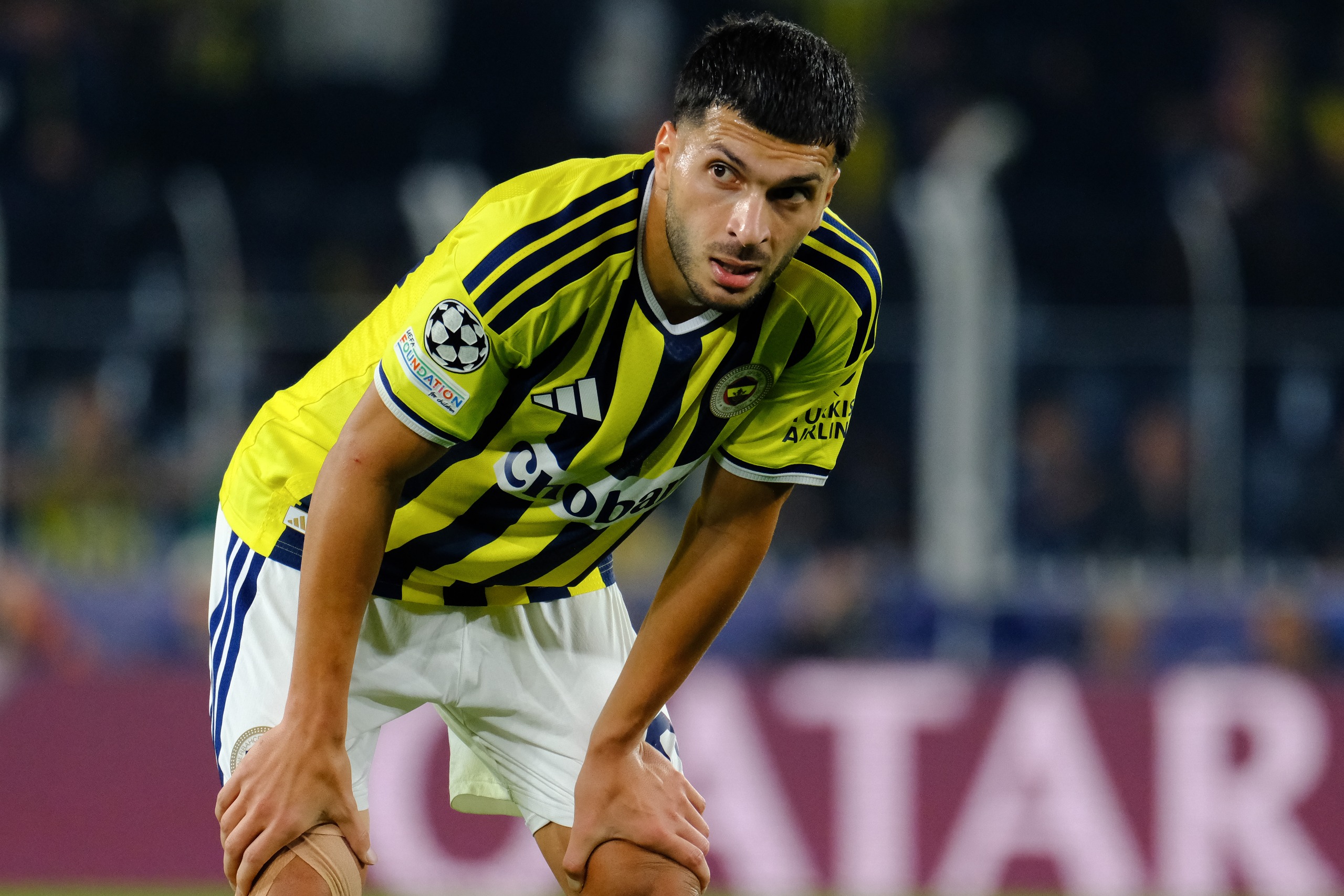 Fenerbahce winger Oguz Aydin taking a breather during a Champions League match