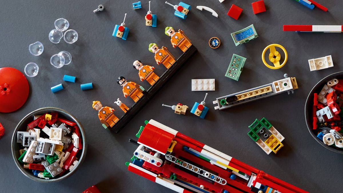 Tintin Moon Rocket in pieces on a gray surface