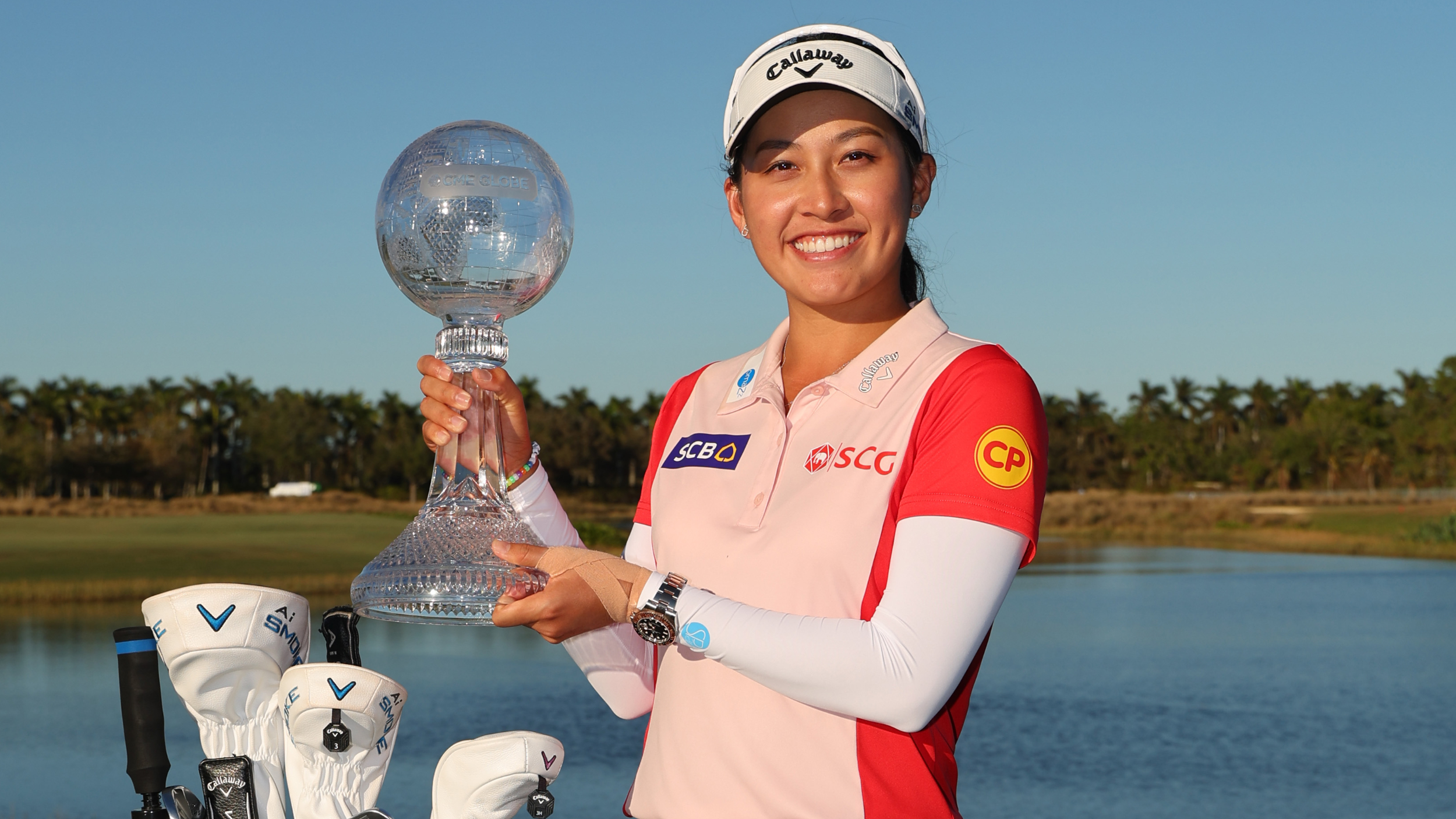 Jeeno Thitikul with the Race to CME Globe trophy