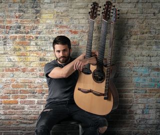 Luca Stricagnoli holds his trademark triple-neck acoustic guitar