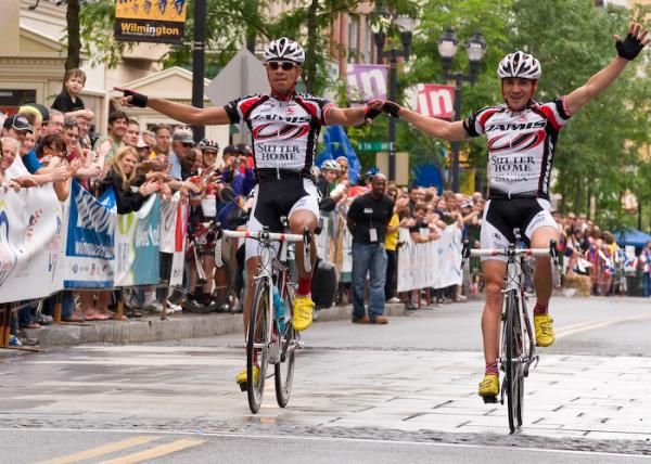 Alejandro Borrajo and teammate Luis Romero-Amaran (Team Jamis\Sutter Home) cross the line hand-in-hand.