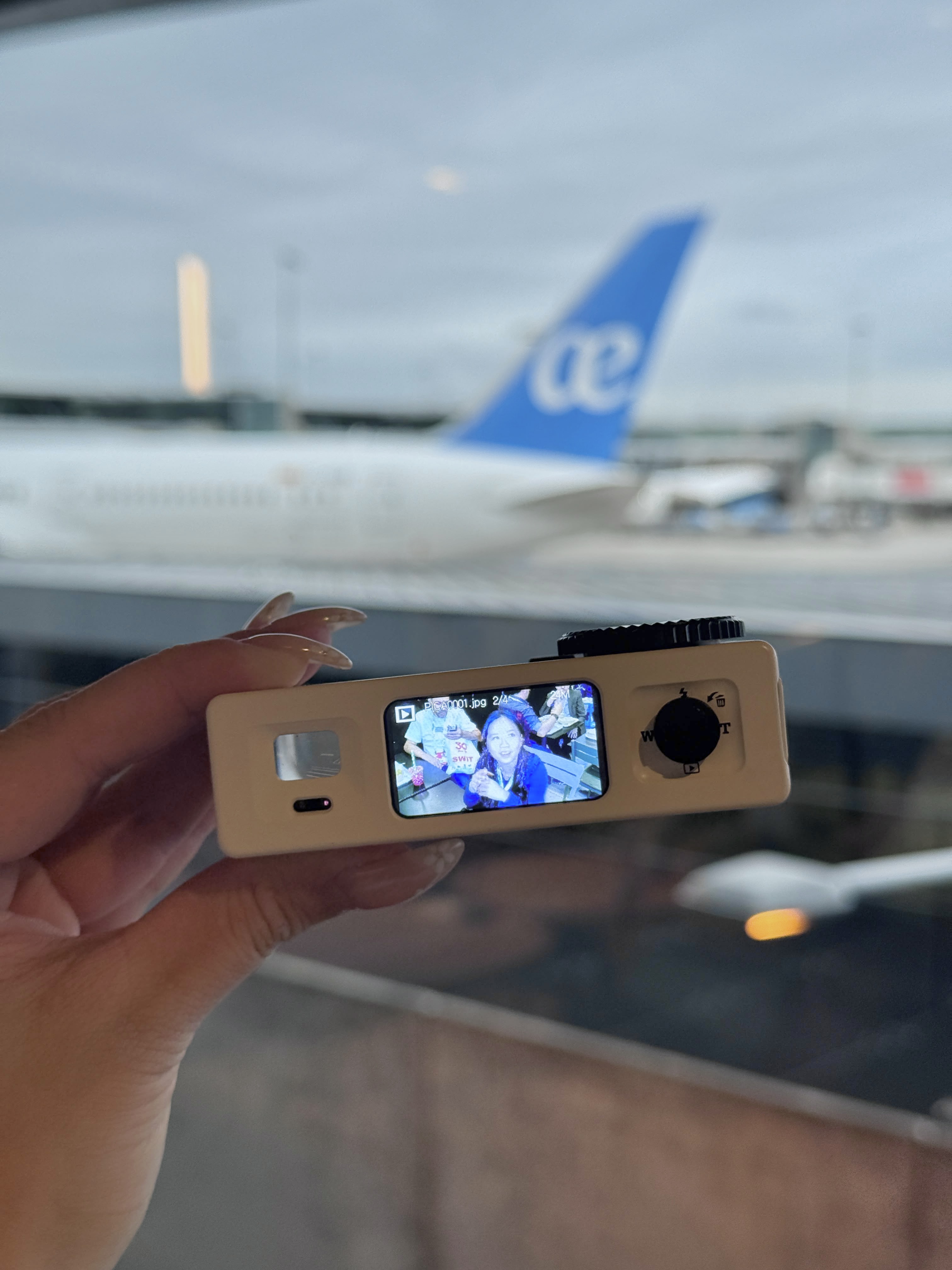 The Yashica Y16 Pocket Camera in a person's hands