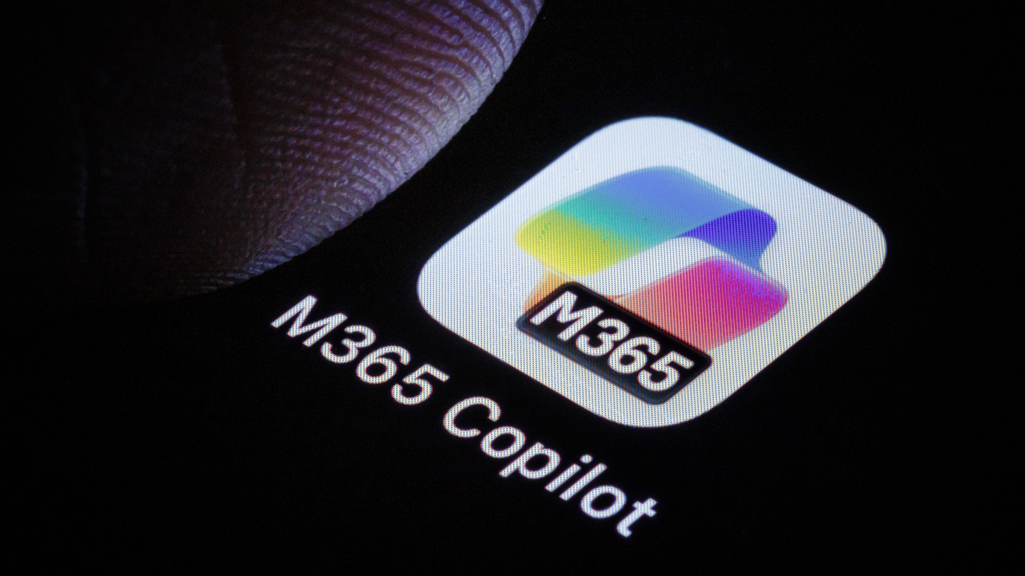 The Microsoft 365 Copilot app is displayed on a smartphone