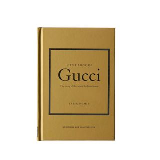 A gold Gucchi book