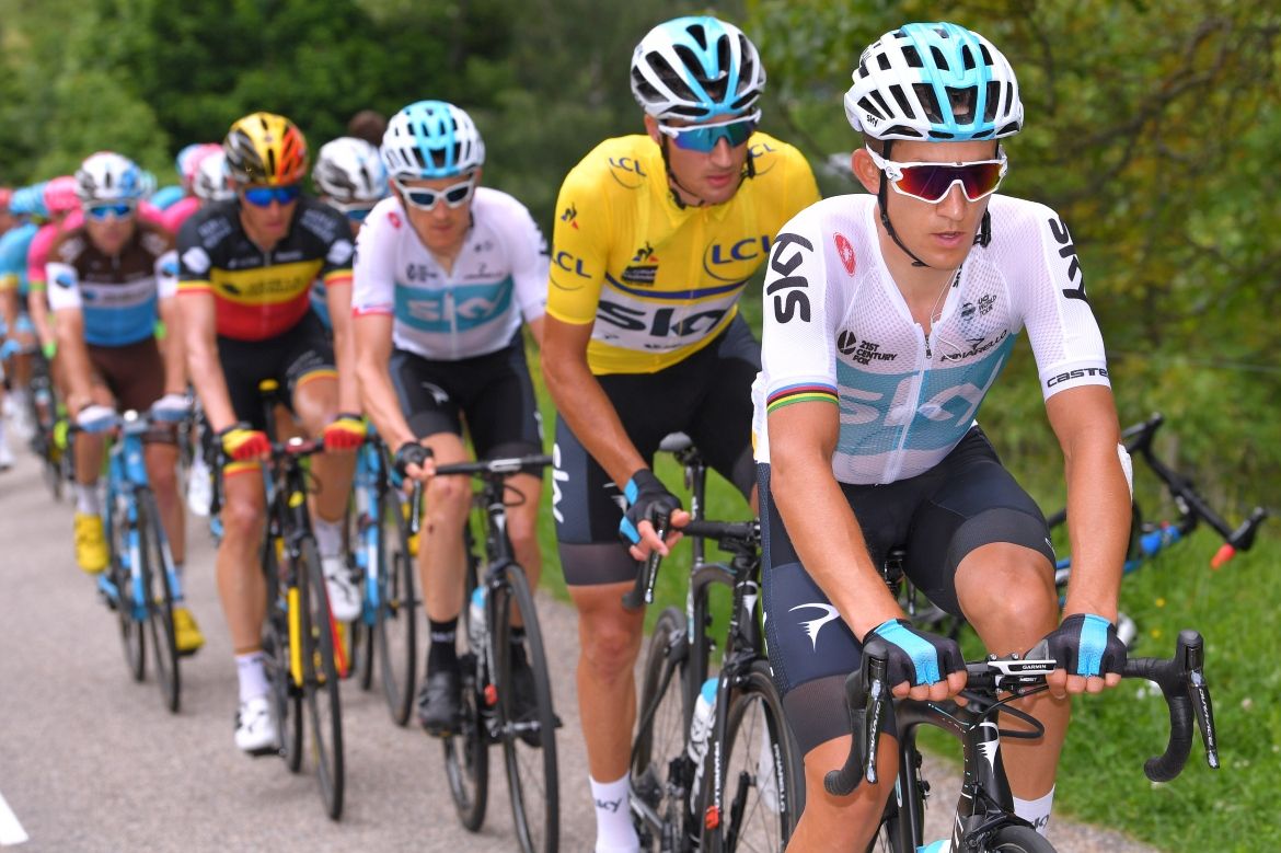 Michal Kwiatkowski rides ahead of race leader Gianni Moscon