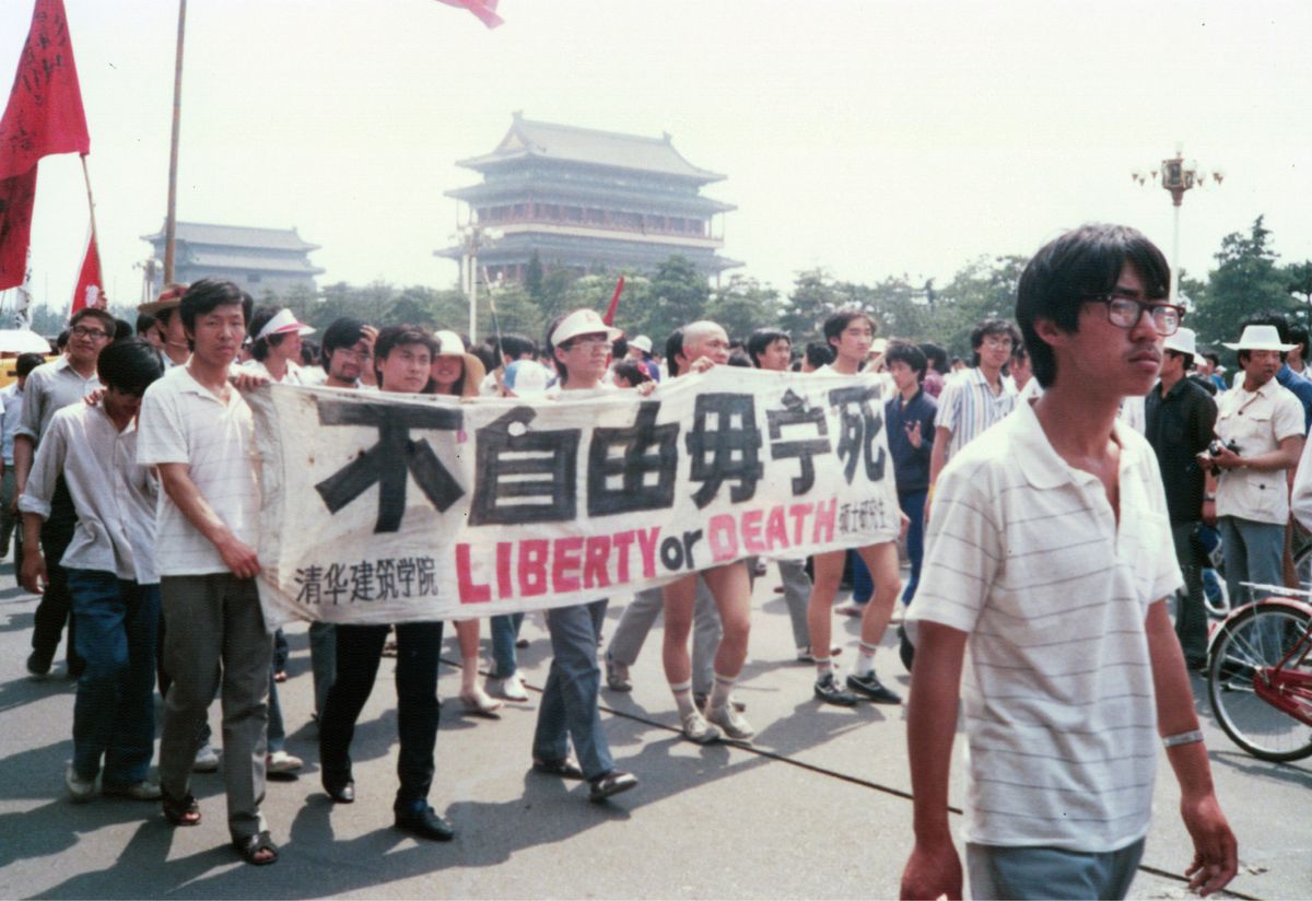 the people march in tiananmen square