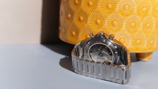 The Certina DS-7 Chrono Auto against a yellow pot