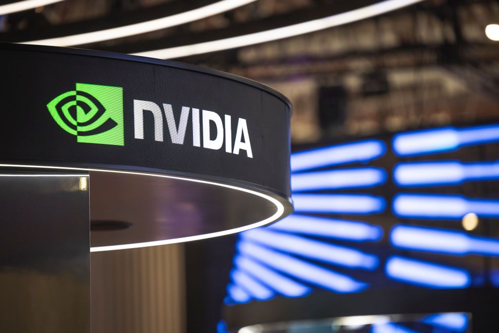 A logo sits illuminated at the NVIDIA booth in Mobile World Congress 2025 on March 6, 2025 in Barcelona, Spain