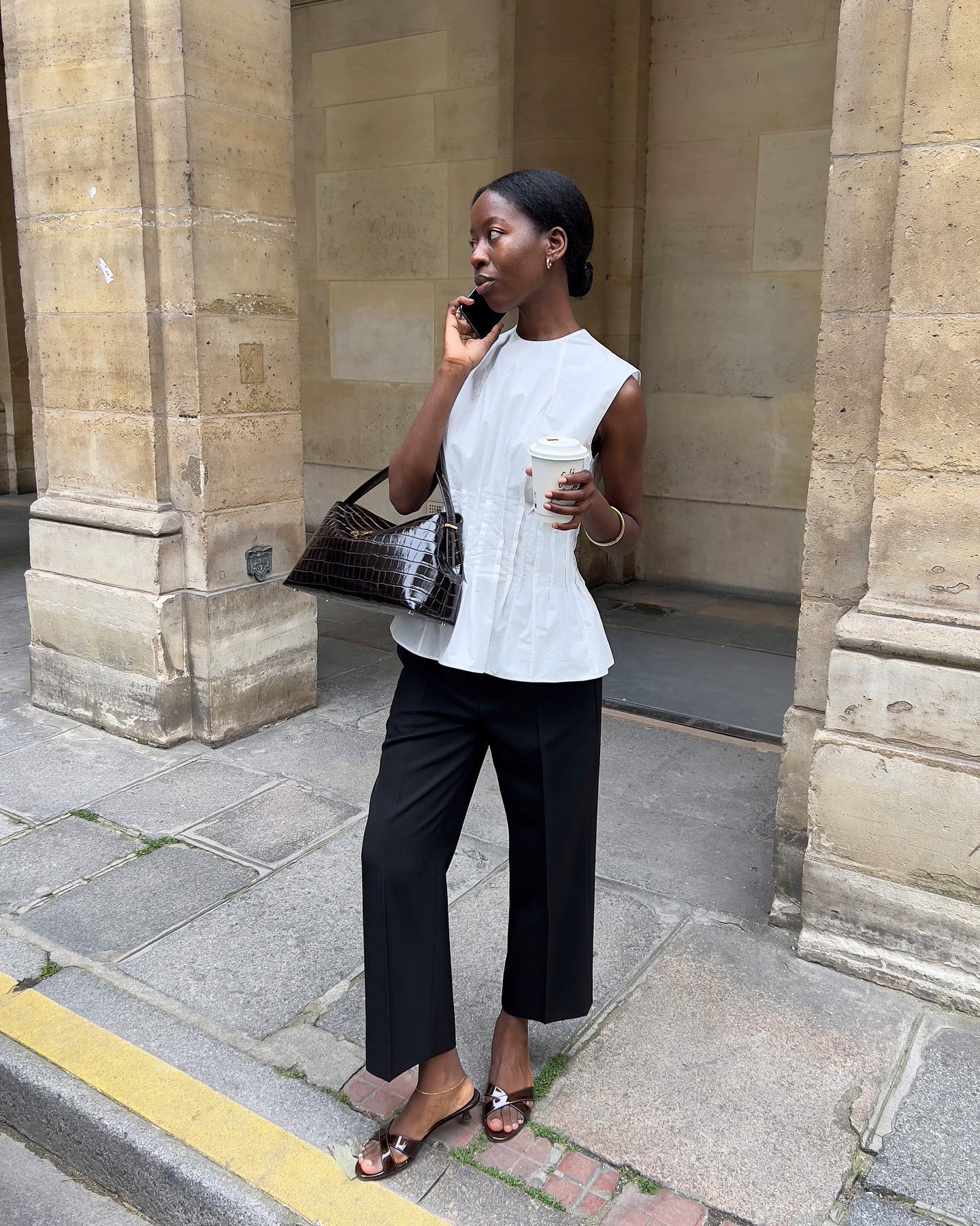 An image of @sylviemus_ wearing summer trouser trends.