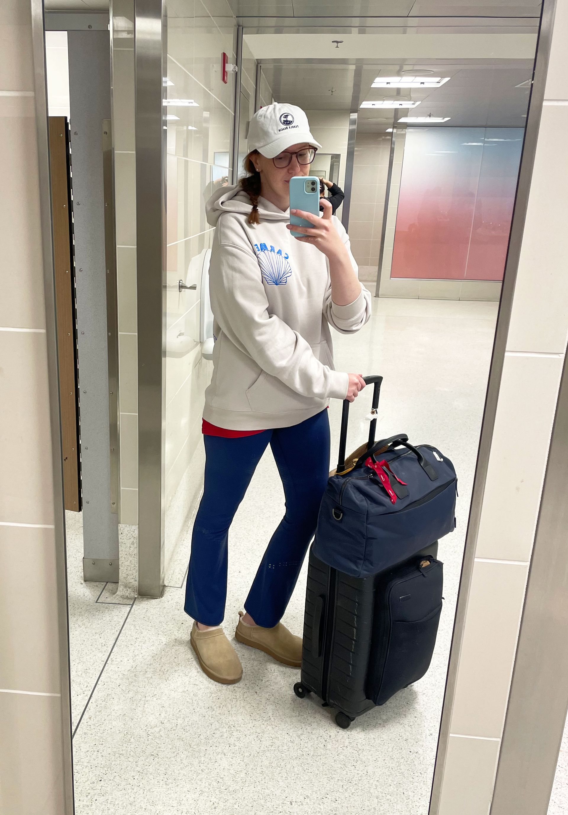 wearing Ugg Micro Slip-Ons at the airport