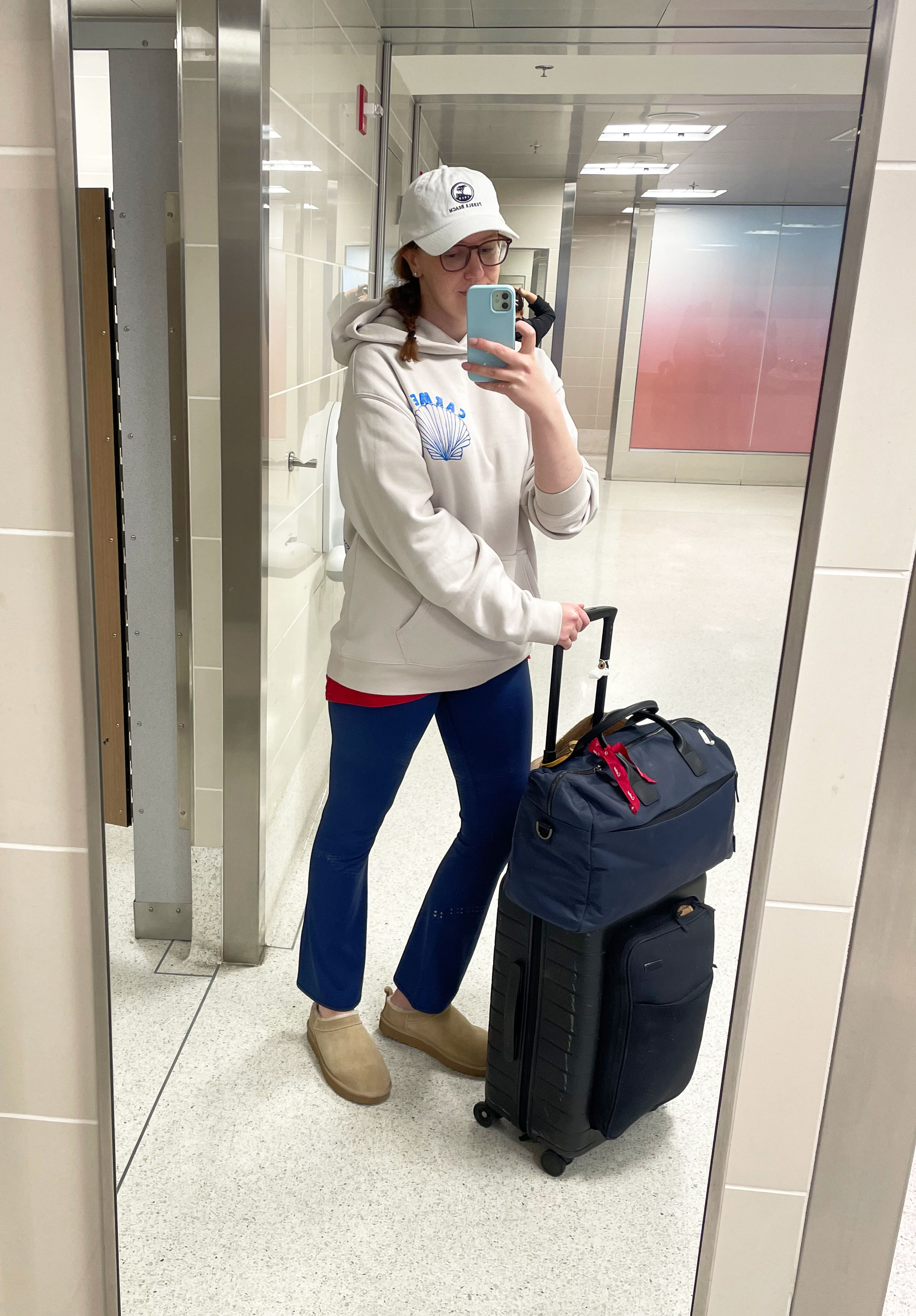 wearing Ugg Micro Slip-Ons at the airport