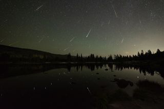 Plenty of meteors — including some fireballs — are visible over Sprague Lake in Rocky Mountain National Park in this photo by astrophotographer Sergio Garcia Rill. He captured these meteors during the peak of the Perseid meteor shower on Aug. 12, 2018.