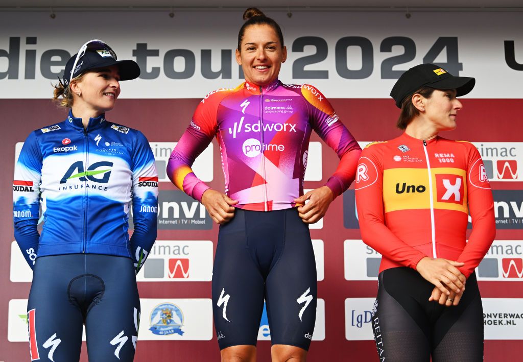 EDE NETHERLANDS OCTOBER 11 LR Ally Wollaston of New Zealand and AG Insurance Soudal Team on second place race winner Barbara Guarischi of Italy and Team SD Worx Protime and Maria Giulia Confalonieri of Italy and Team UnoX Mobility on third place pose on the podium ceremony after the 26th Simac Ladies Tour 2024 Stage 4 a 1182km stage from Ede to Ede UCIWWT on October 11 2024 in Ede Netherlands Photo by Luc ClaessenGetty Images