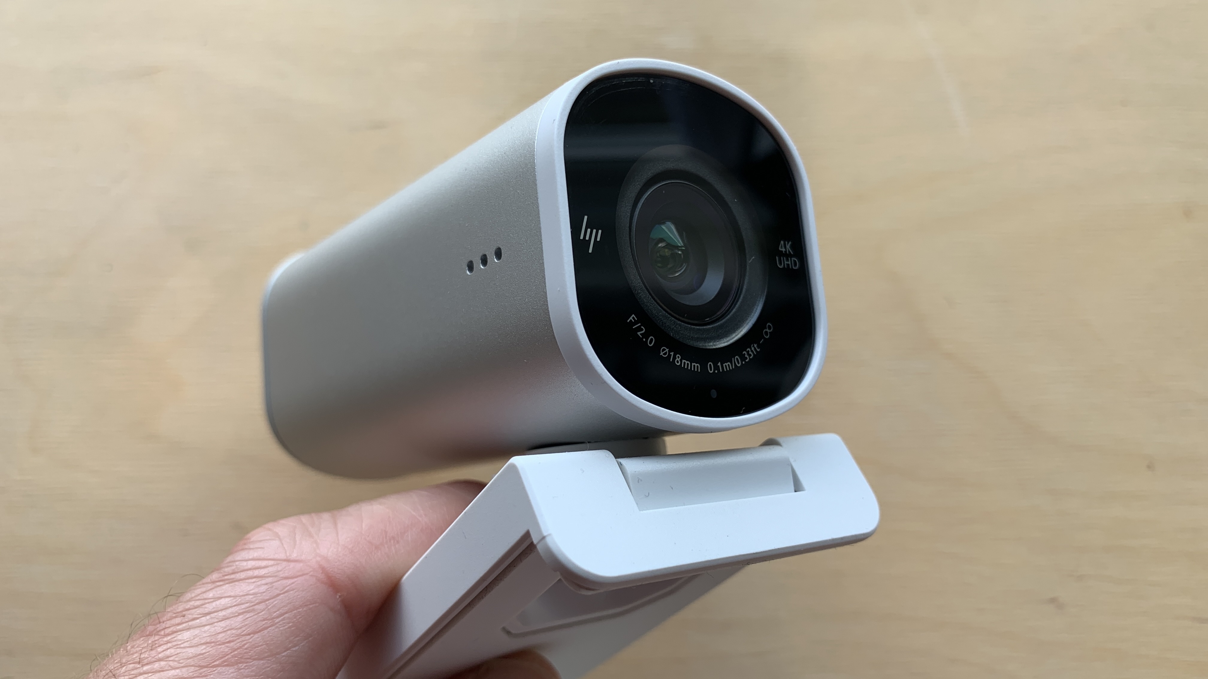 HP 960 4K Streaming Webcam Held in a Hand