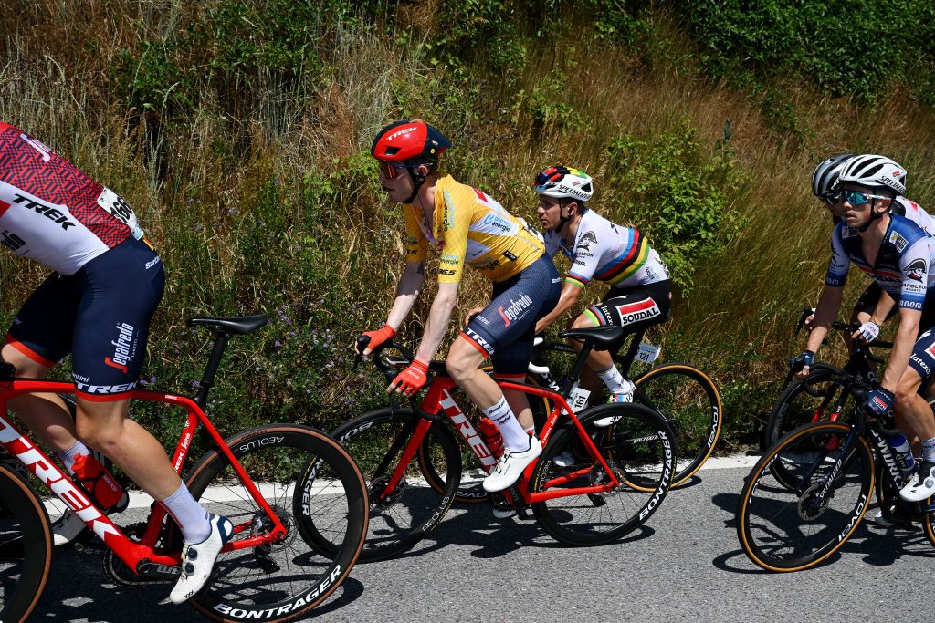 LEUKERBAD SWITZERLAND JUNE 14 LR Mattias Skjelmose Jensen of Denmark and Team TrekSegafredo Yellow leader jersey and Remco Evenepoel of Belgium and Team Soudal QuickStep compete during the 86th Tour de Suisse 2023 Stage 4 a 1525km stage from Monthey to Leukerbad 1367m UCIWT on June 14 2023 in Leukerbad Switzerland Photo by Dario BelingheriGetty Images