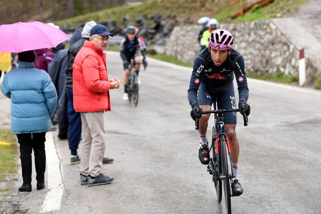 CORTINA DAMPEZZO ITALY MAY 24 Egan Arley Bernal Gomez of Colombia and Team INEOS Grenadiers Pink Leader Jersey attack on breakaway during the 104th Giro dItalia 2021 Stage 16 a 153km stage shortened due to bad weather conditions from Sacile to Cortina dAmpezzo 1210m Public Fans girodiitalia Giro on May 24 2021 in Cortina dAmpezzo Italy Photo by Tim de WaeleGetty Images