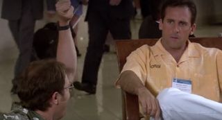 Michael Scott in a yellow shirt in The Convention episode of The Office