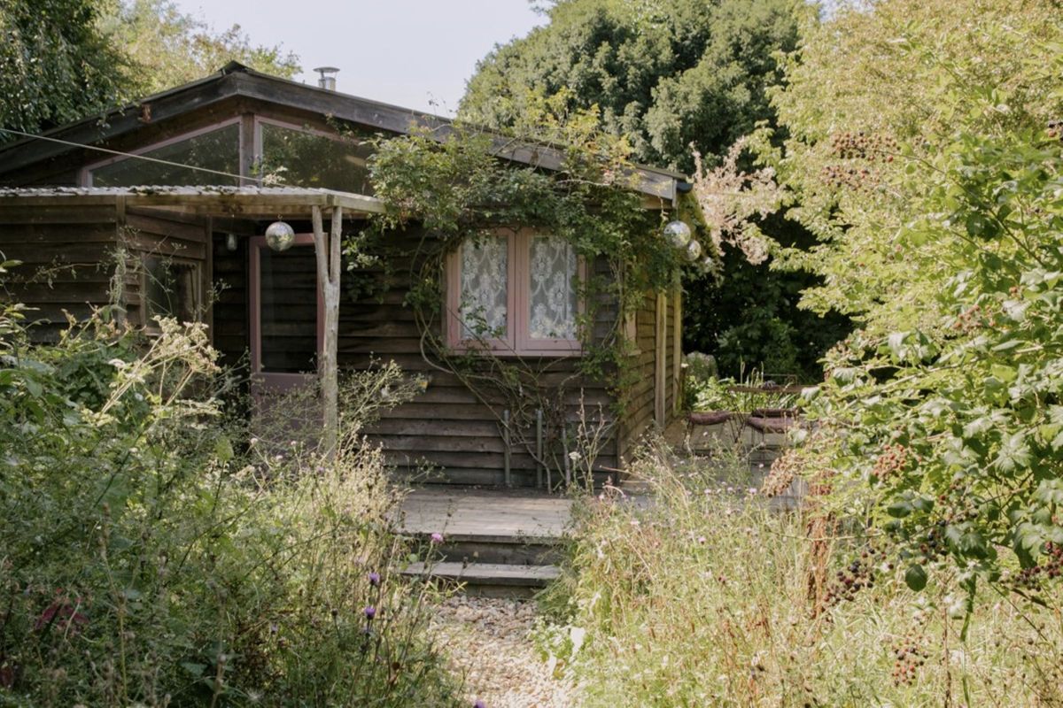 A cabin at the bottom of the garden