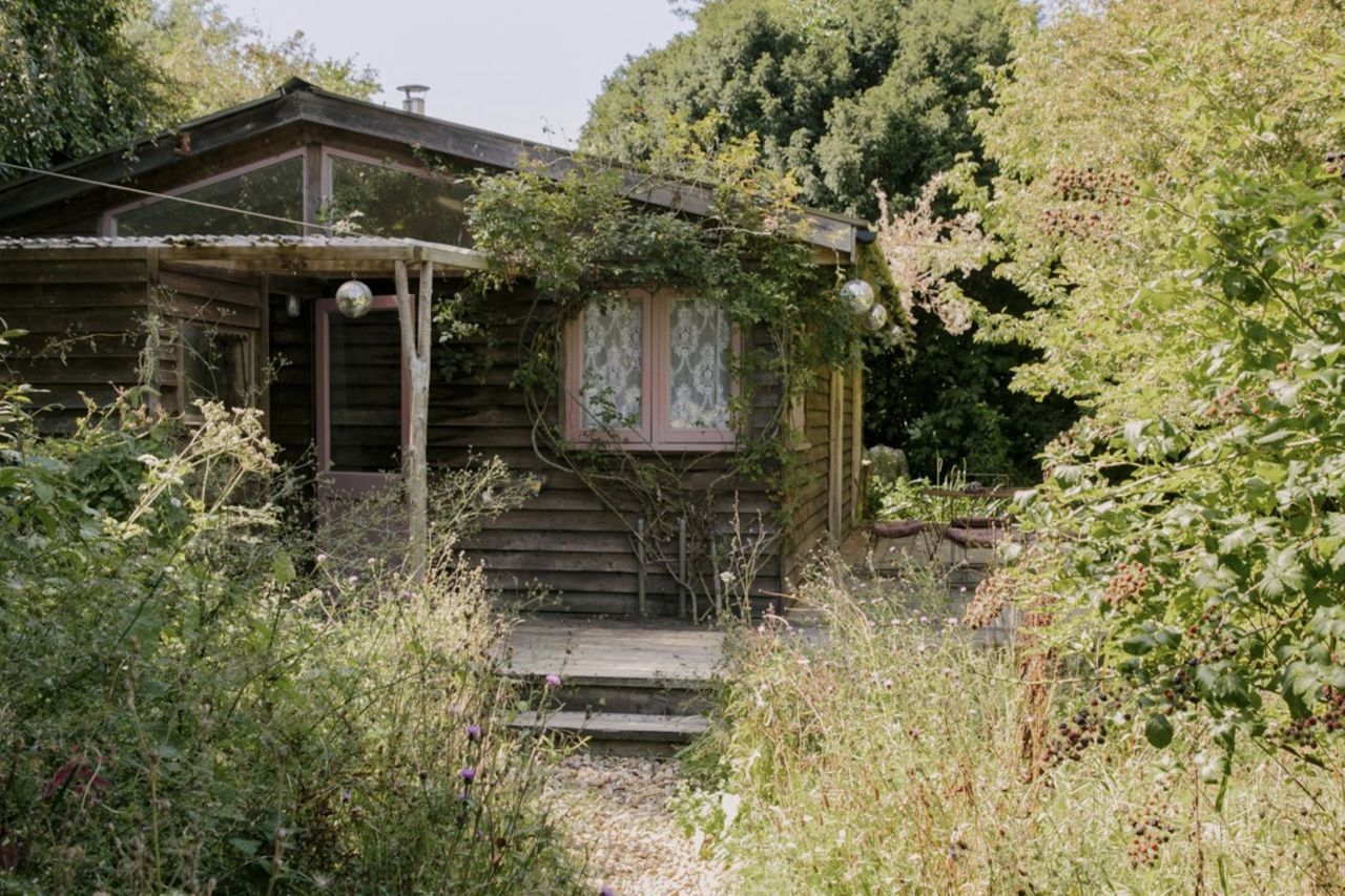 A cabin at the bottom of the garden