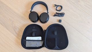 Sennheiser Momemtum 4 Wireless and its bundled accessories