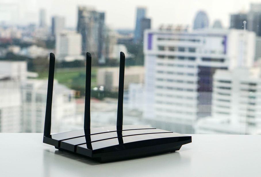 A Wi-Fi router on a windowsill.