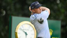 Brad Dalke hits a driver off the tee 