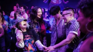 Kelly Marie Tran and Lily Gladstone dancing with Han Gi-chan and Bowen Yang in The Wedding Banquet.