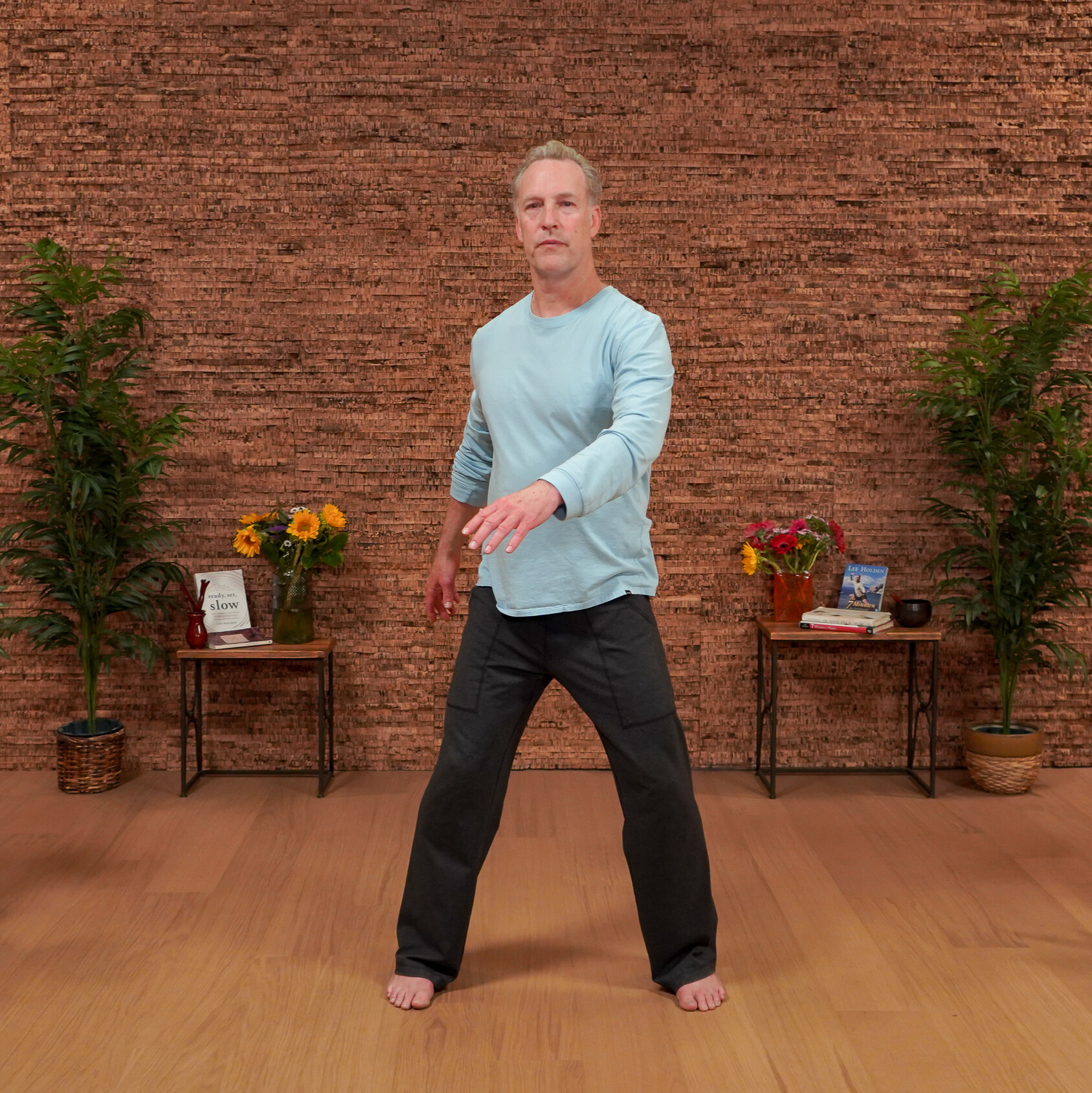 Man demonstrating Qigong movements