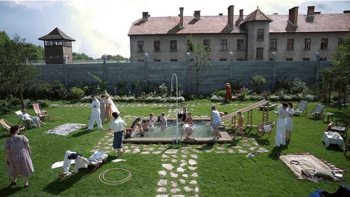 Cast of The Zone of Interest playing in a pool