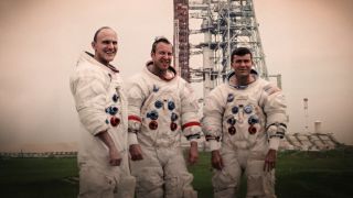 Three astronauts