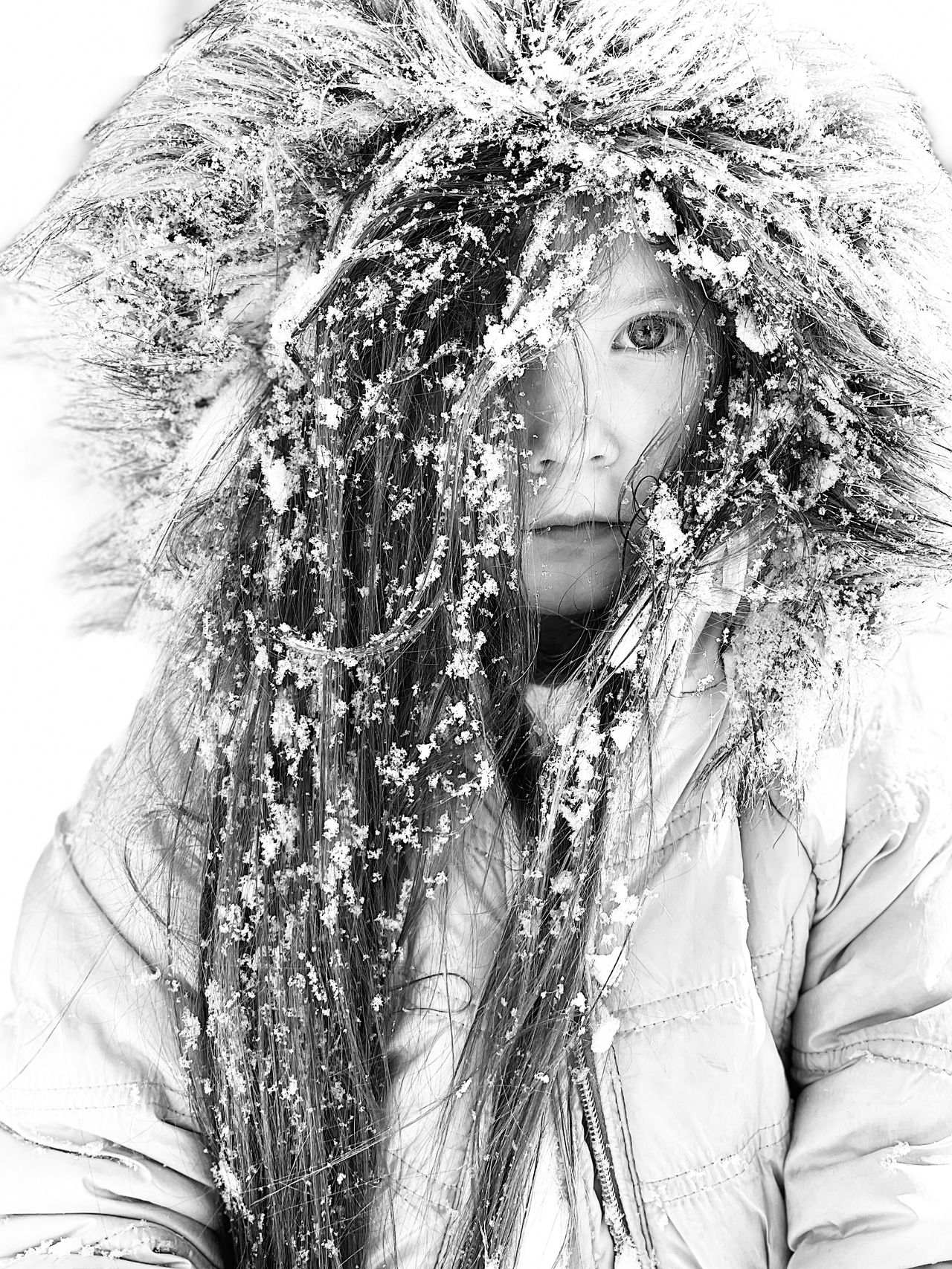 Untitled portrait of girl in snow for the iPhone Photography Awards 2021