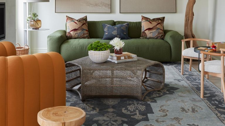 a living room with a green and orange color combination
