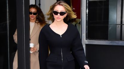 Sydney Sweeney in a black blazer dress in New York.