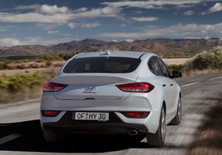 The reverse of the Hyundai i30 Fastback on the road