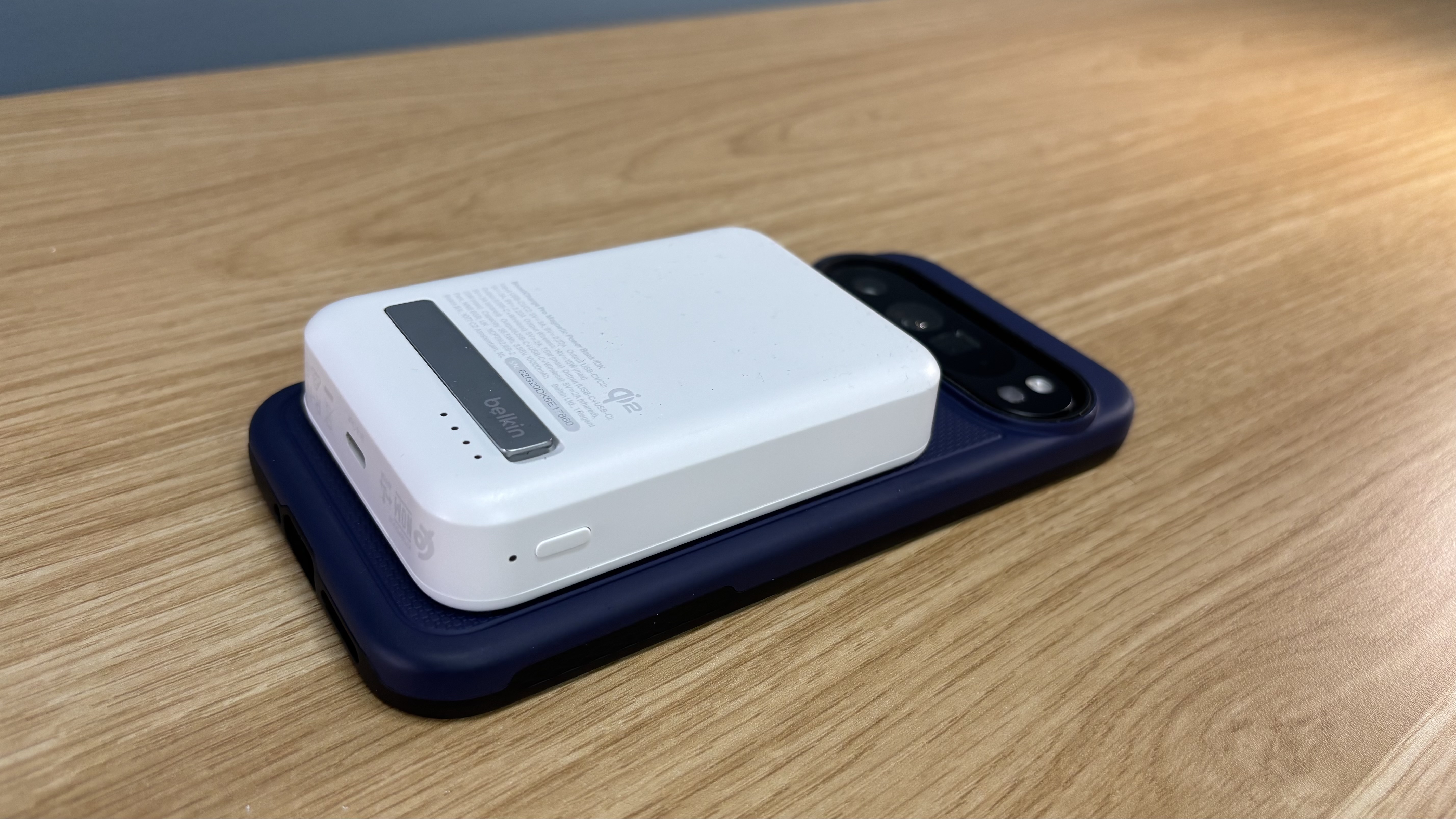 Belkin Boostcharge Pro 15W Qi2 power bank on the back of a Google Pixel 9 Pro XL