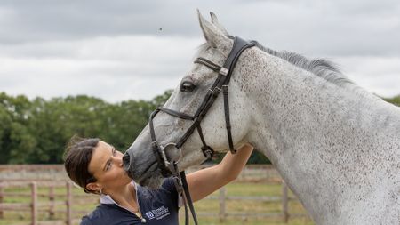 Bubby Upton kisses Its Cooley Time in a photoshoot at home in the summer of 2025.