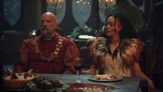 Sigismund Dijkstra (Graham McTavish) and Philippa Eilhart (Cassie Clare) at a banquet in The Witcher season 3