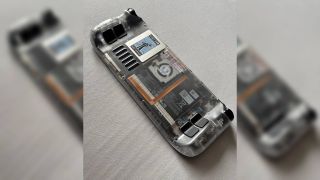 The underside of a Valve Steam Deck that's been repaired by a Redditor with replaced buttons, featuring a translucent back