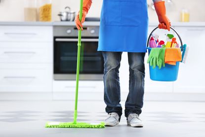 Cleaning jobs: Person cleaning in a kitchen