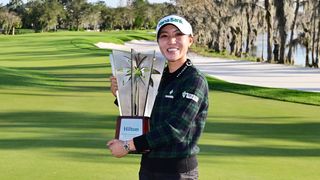 Lydia Ko holds the Hilton Grand Vacations Tournament of Champions trophy