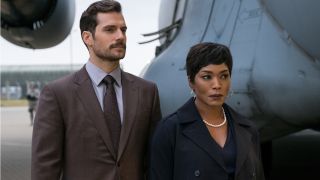 Henry Cavill and Angela Bassett standing together next to a massive plane engine in Mission: Impossible - Fallout.